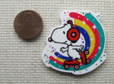 Second view of rainbow skating Snoopy needle minder.