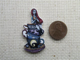 Second view of Sally Sitting on a Stack of Teacups Needle Minder.