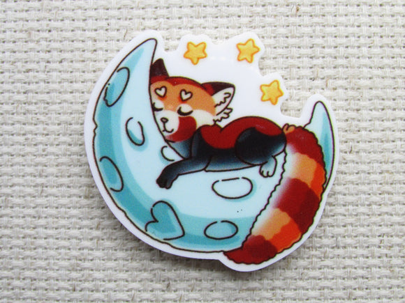 First view of Fox/Red Panda Sleeping on a Crescent Moon Needle Minder.