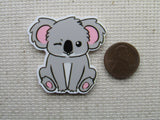 Second view of winking koala needle minder.