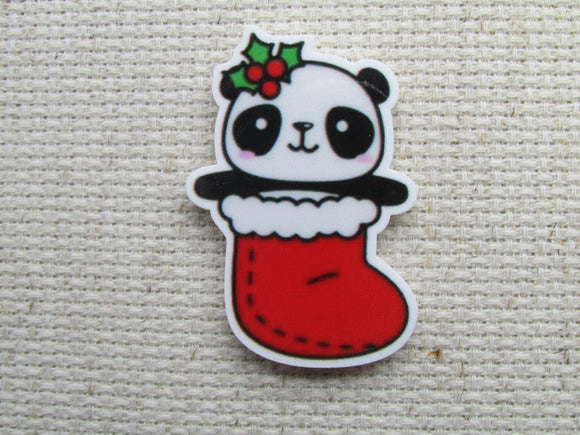 First view of Christmas panda in a stocking needle minder.