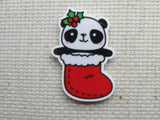 First view of Christmas panda in a stocking needle minder.
