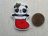 Second view of Christmas panda in a stocking needle minder.