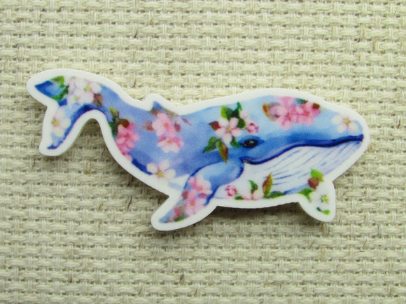 First view of blue floral whale needle minder.
