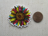 Second view of colorful sunflower needle minder.