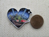 Second view of for the love of the alien child needle minder.
