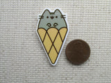 Second view of grey cartoon cat in an ice cream cone needle minder.