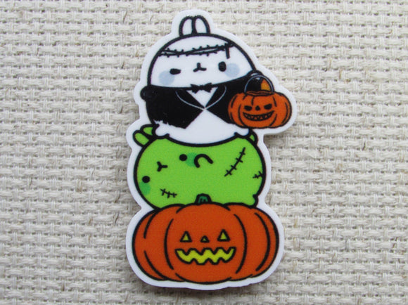 First view of cartoon characters Halloween totem pole needle minder.