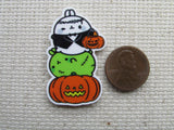 Second view of cartoon characters Halloween totem pole needle minder.