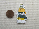 Second view of a tower of cats needle minder.