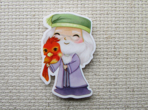 First view of Professor Dumbledore with a Young Fawkes Needle Minder.