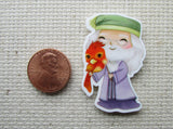Second view of Professor Dumbledore with a Young Fawkes Needle Minder.