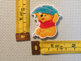 Third view of the Pooh Hiding from the Rain Needle Minder