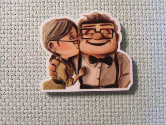 First view of the Ellie Kissing Carl Needle Minder