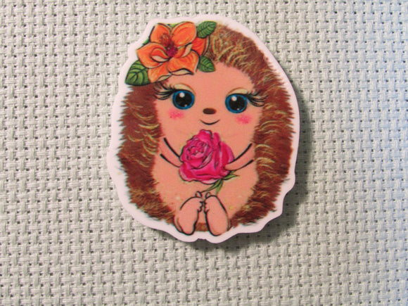 First view of the Adorable Flower Holding Hedgehog Needle Minder