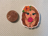 Second view of the Adorable Flower Holding Hedgehog Needle Minder