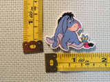 Third view of the Eeyore with a Butterfly on his Tail Needle Minder