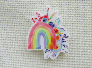 First view of floral rainbow needle minder.