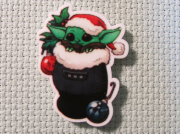 First view of the Alien Child in A Christmas Stocking Needle Minder