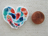Second view of A Heart of Feathers Needle Minder.
