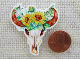 Second view of bull skull adorned with sunflowers needle minder.