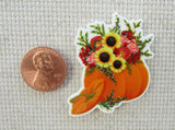 Second view of a flower filled pumpkin needle minder.