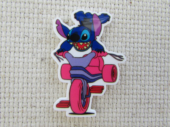 First view of Stitch Riding on a Pink Tricycle Needle Minder.