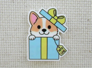 First view of Corgi Puppy Present Needle Minder.