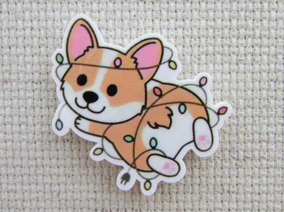 First view of Corgi Tangled in the Christmas Lights Needle Minder.
