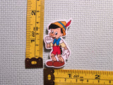 Third view of the Pinocchio Needle Minder