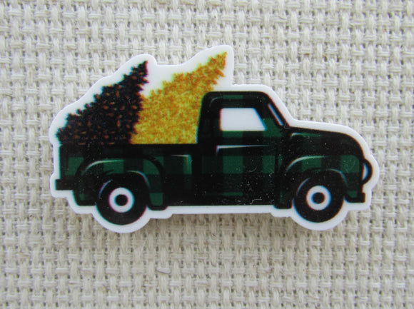 First view of Black and Green Checkered Truck Needle Minder.