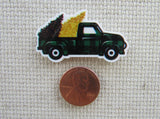 Second view of Black and Green Checkered Truck Needle Minder.