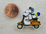 Second view of Snoopy and Woodstock Riding a Scooter Needle Minder.