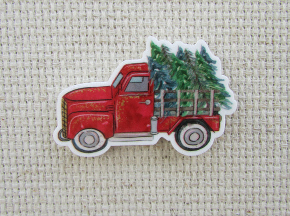 First view of Christmas stake bed pickup truck needle minder.