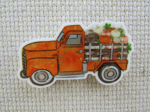 First view of Orange Harvest Truck Needle Minder.