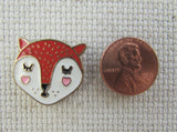 Second view of Sleepy Fox Face Needle Minder.