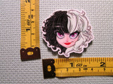 Third view of the Cruella Face Needle Minder