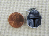 Second view of Mandalorian Helmet with a Grogu Needle Minder.