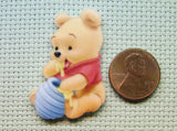 Second view of the Pooh Bear Eating Honey Needle Minder